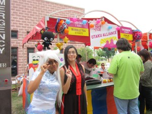Photo of Otaku Alliance members at their PACfest 2013 booth.