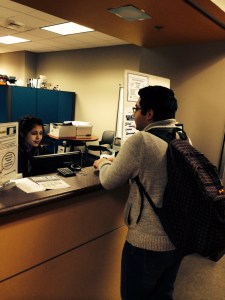 Photo of Palo Alto student getting help from a financial aid staff member.