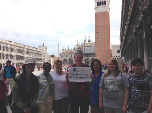 Photo of Sabra Booth, Jacquelyn Carroll, Cindie Kidwell, Linda Iglehart, Keisha Gonzales, Megan Meyers and Marcus Langham explore the streets of Italy.