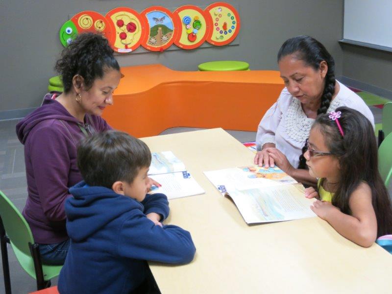 Families reading bilingual children's stories