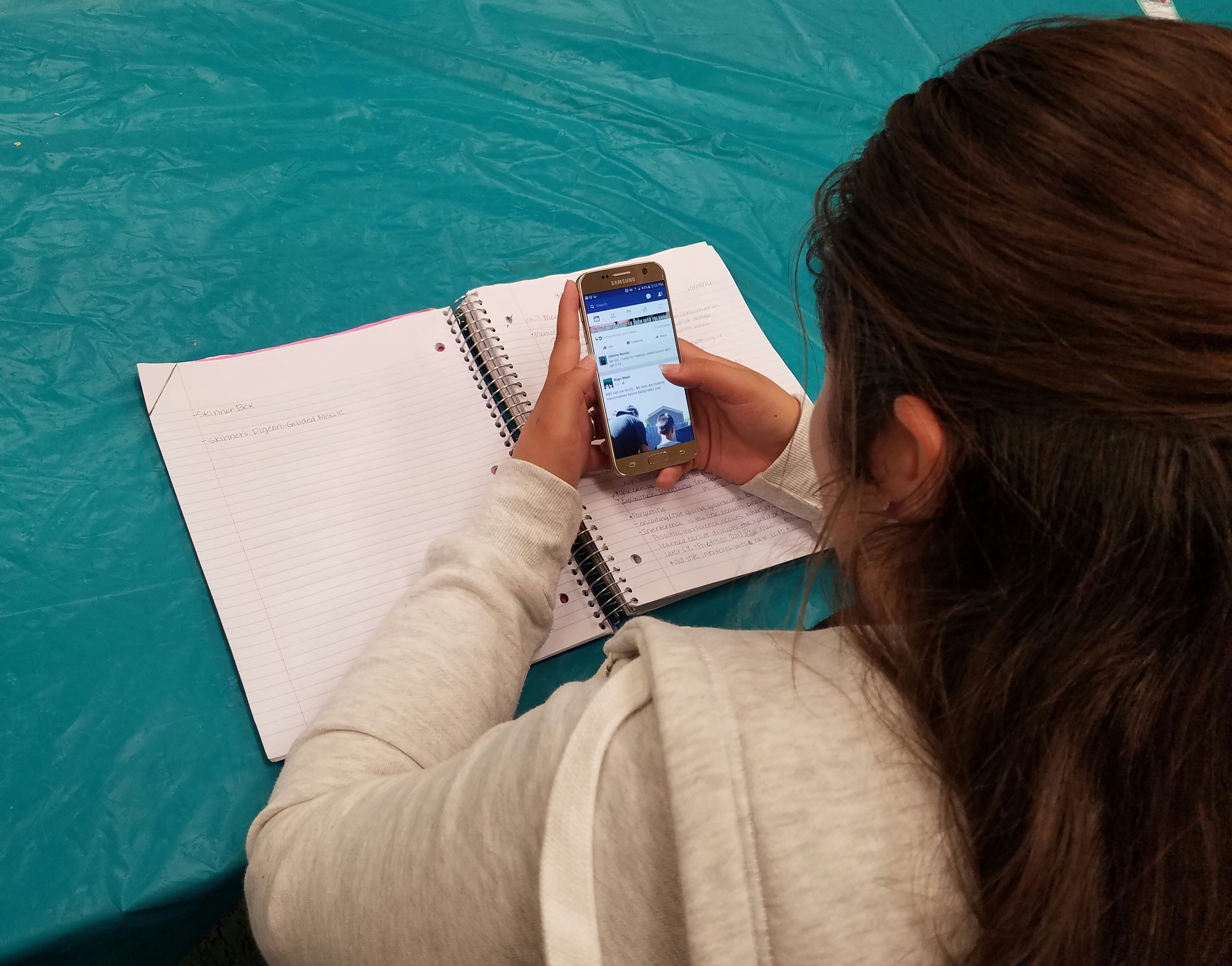 Student using phone when studying.