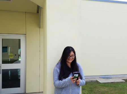 Lizzie Garses, an Early Childhood Development major, chats with a friend between classes.