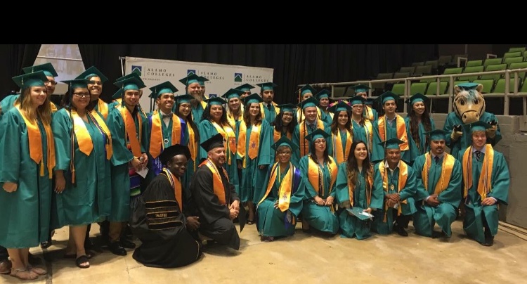 Phi Theta Kappa students show off their cords with Primo the palomino. Photo by Officer of Phi Theta Kappa.